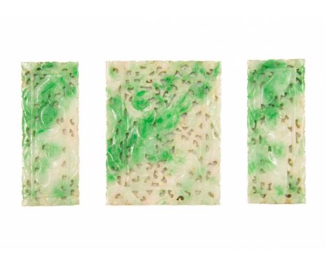 Three Chinese pierced jade plaques, early 20th century. The largest decorated with two figures amongst foliage, 4 x 3.2cm and