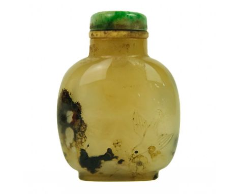 A Chinese agate snuff bottle, Qing Dynasty, early-mid 19th century.  With birds and foliage, height 6cm, width 4.8cm, depth 2