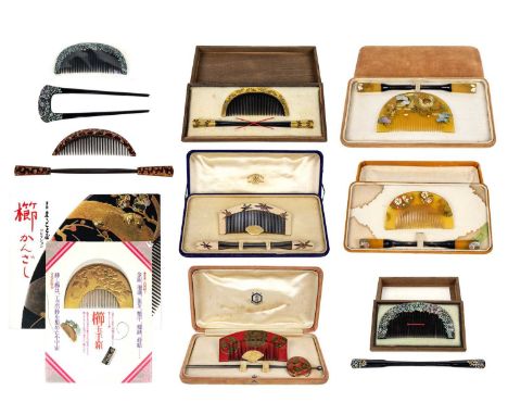 Six Japanese cased comb and kogai sets. A Japanese black lacquer &amp; mother-of-pearl comb and matching kanushi; two books o