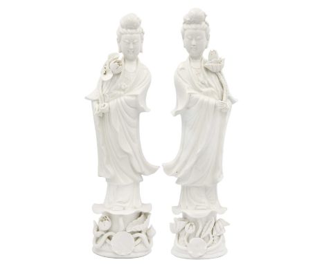 Two Chinese blanc de chine figures of Guanyin, 20th century. Height 38.5cm, width 10cm, depth 9cm. (2)The Vandekar family est