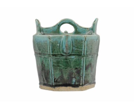 A Chinese Shiwan pottery green-glazed teapot, 19th century. Height 20cm, width 19.5cm, depth 19.5cm.