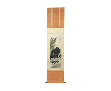 A Chinese painted scroll depicting a hen and chicks, early 20th century. With calligraphy and red seals, 210 x 47cm, image si