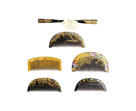 A Japanese gilded comb, Edo period.  3.5 x 8.8cm; a Japanese comb (kushi) and kogai, circa 1930's, signed, decorated with gra