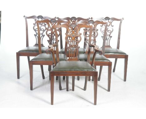 A good quality set of six Chippendale style dining chairs, early 20th Century
Each with a shell crest above an interlaced spl