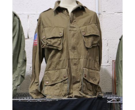 An American post-war tunic, with Airborne embroidered patch, sized 46R. UK P&amp;P Group 2 (£20+VAT for the first lot and £4+