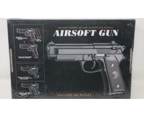 New old stock airsoft pistol, model V22 in black, boxed and factory sealed. UK P&amp;P Group 1 (£16+VAT for the first lot and