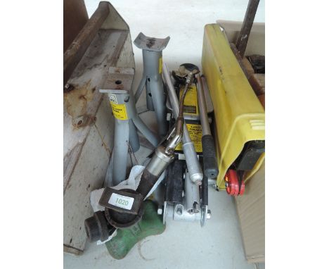 A selection of garage and car tools including jack
