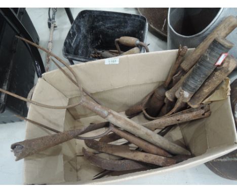 A selection of hedging and hay making tools