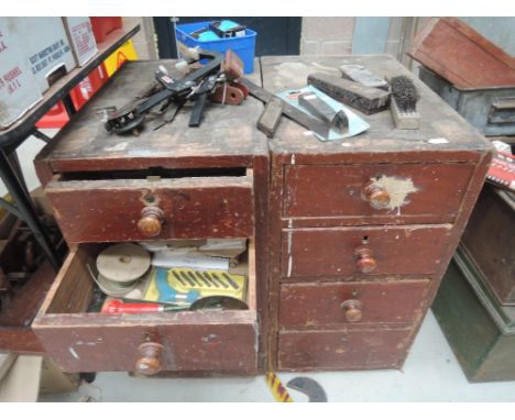 Two pedestal desk ends with tools and contents
