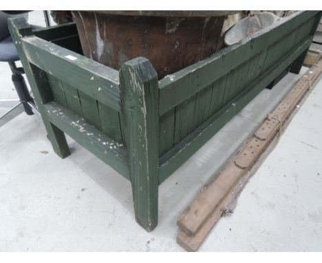 A large painted bedding trough
