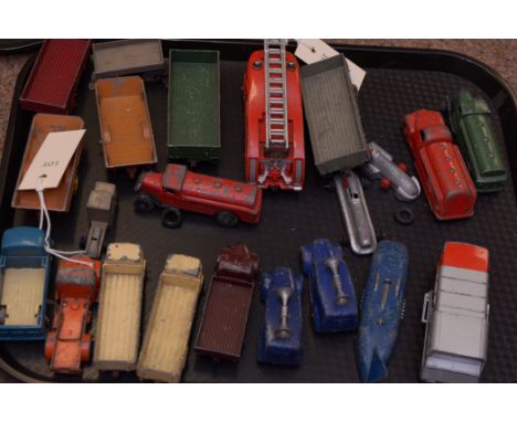 Dinky Toys, to include: fire engine 555; trailers; speed cars; petrol tankers; loud hailing vans; an Austin flat-back truck; 