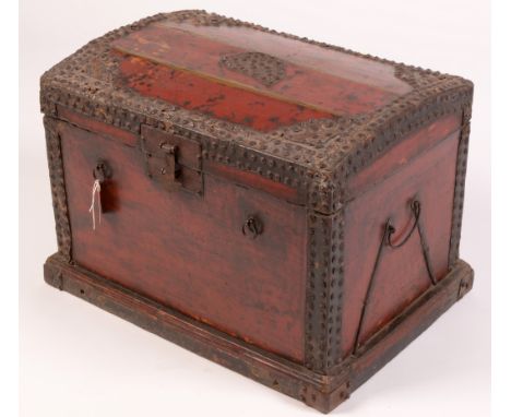 A Chinese red painted and beaded wooden trunk, 65cms wide.