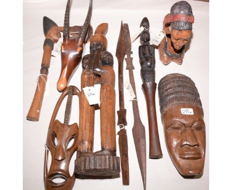 Africa tourist wares, wall carvings, spears, an axe, mostly from Solwezi tribe, Zambia.