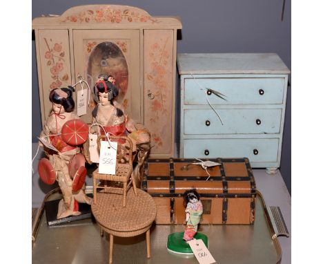 Doll's furniture, to include: a floral painted wardrobe; chest of three drawers; a trunk, wicker furniture; together with thr