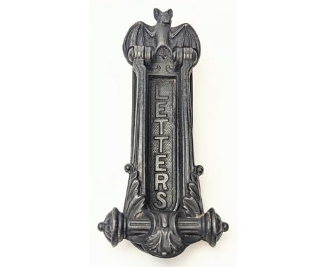 A Victorian Gothic style cast iron bat letter box/door knocker by Archibald Kenrick &amp; Sons, L.25cm