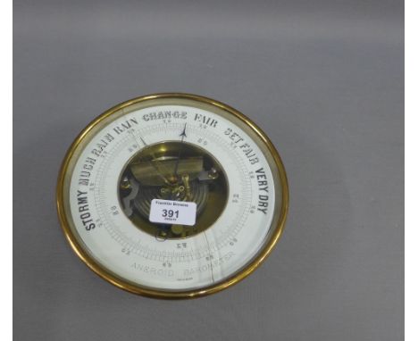 Circular brass cased aneroid wall barometer