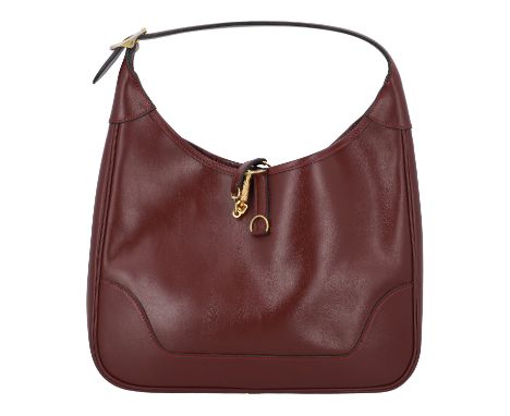 HERMÈS VINTAGE Schultertasche "TRIM". Koll. 1982. Klassisches Modell aus Glattleder in Bordeaux mit vergoldeter Hardware. Gep