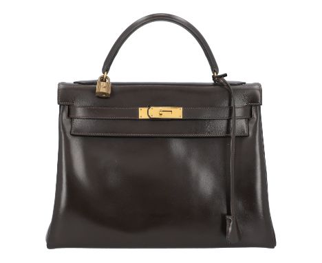 HERMÈS VINTAGE Handtasche "KELLY BAG 32". Koll. 1975. Klassisches Modell aus Glattleder in Dunkelbraun mit goldfarbener Hardw