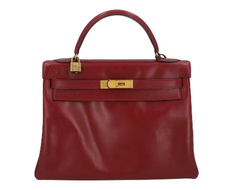 HERMÈS VINTAGE Handtasche "KELLY BAG 32". Koll. 1987. Klassisches Modell aus Glattleder in Bordeaux mit goldfarbener Hardware