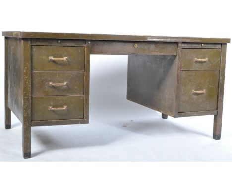 A retro vintage mid 20th Century industrial factory works metal writing table desk having a large vinyl writing sciver top wi