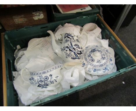 A box of J and G Meakin dinner wares, blue and white foliate design