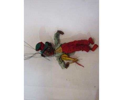 A unboxed Pelham puppet minstrel with banjo
