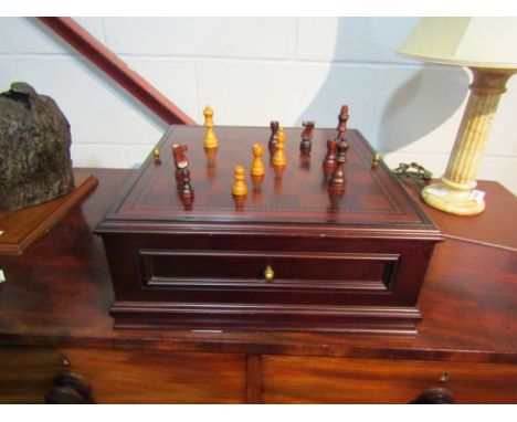 A Victorian style chess/backgammon set within a fitted case with chequerboard top