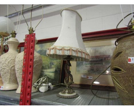 A brass and marble lamp
