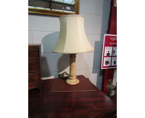 An Architectural column form table lamp base with shade