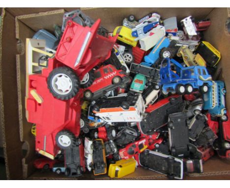 A large box of mixed diecast vehicles including Corgi, large plastic combine etc