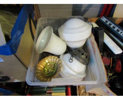A box of lamp shades and fixtures