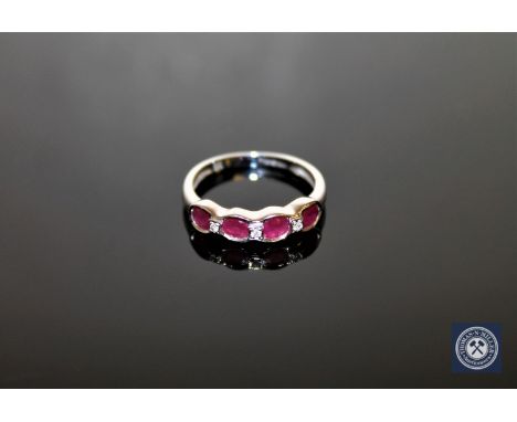 A ruby and diamond half-eternity ring, size N