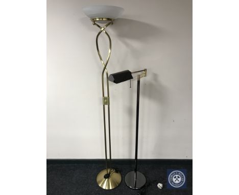 A brass uplighter and a reading floor lamp 