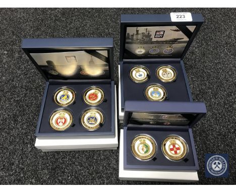 Three gold-plated and enamelled Royal Navy coin sets; The Invincible Class Carrier Collection, The Vanguard Class Submarine C