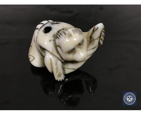 A Japanese ivory netsuke