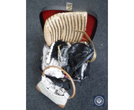 A vintage case of lady's hand bags, Hopper hand bag, purses and a sequin jacket 