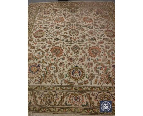 A floral Axminster fringed carpet