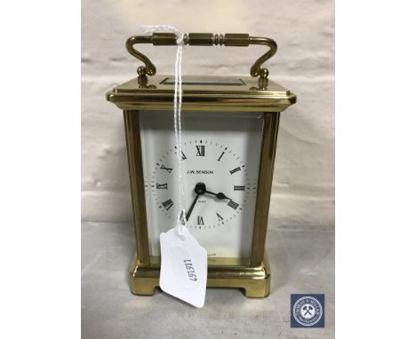 A brass cased French carriage clock