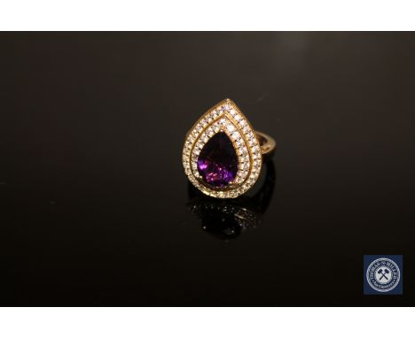 A 9ct gold amethyst and zircon cluster ring, size N/O CONDITION REPORT: 7.9g