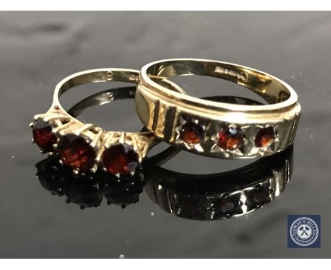 Two 9ct gold garnet set rings CONDITION REPORT: 5.6g gross