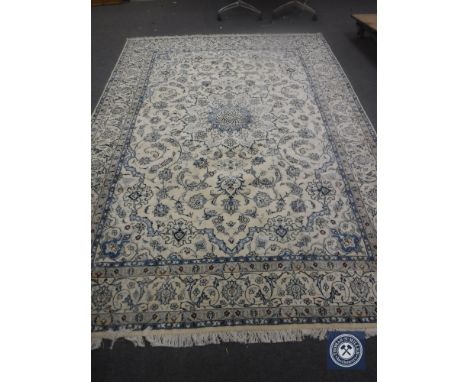 A very fine Persian Nain carpet, Central Iran, 357cm by 251cm