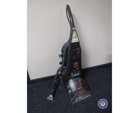 A Bissell Pro Heat carpet cleaner 