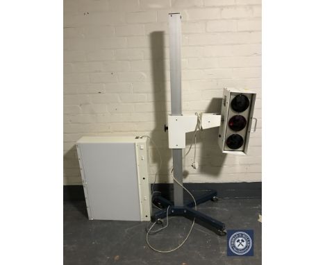 A Theralux health lamp on trolley together with a light box