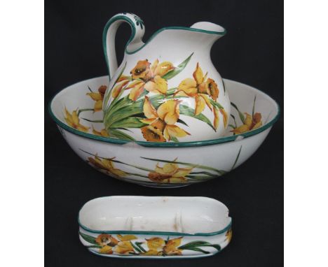 WEMYSS POTTERY BULBOUS JUG AND BASIN SET together with tooth brush holder base, overall decorated with daffodils, impressed p