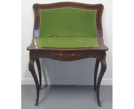 19TH CENTURY FRENCH DESIGN ROSEWOOD, SERPENTINE SHAPED, FOLD OVER CARD TABLE, overall inlaid with foliate designs and having 