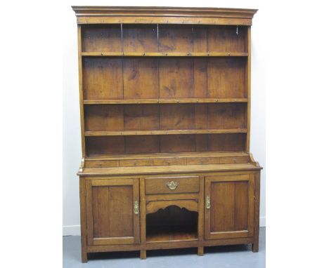 19TH CENTURY WELSH OAK DOG KENNEL DRESSER, having boarded, three shelf rack over a shelf of five dummy spice drawers, central