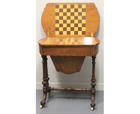 VICTORIAN INLAID WALNUT FOLD OVER GAMES AND SEWING TABLE, having amboyna banded, 'D' ended top, opening to reveal inlaid ches