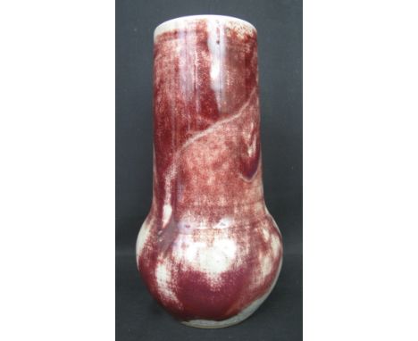 Fine Ruskin Art Pottery cylinder vase with overall Sang de Boeuf running high fired glaze, baluster shaped base tapering to t
