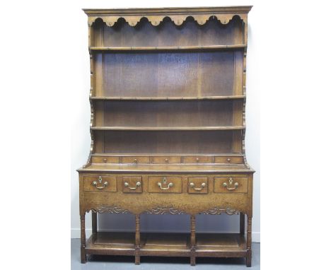 LATE 18TH CENTURY WELSH OAK POTBOARD DRESSER, having three shelf rack with later boarded back under a moulded cornice with sh
