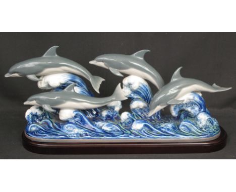 MODERN LLADRO SPANISH PORCELAIN LARGE ANIMAL GROUP OF A POD OF FOUR DOLPHINS cruising the waves, no. 6436 to base, printed an